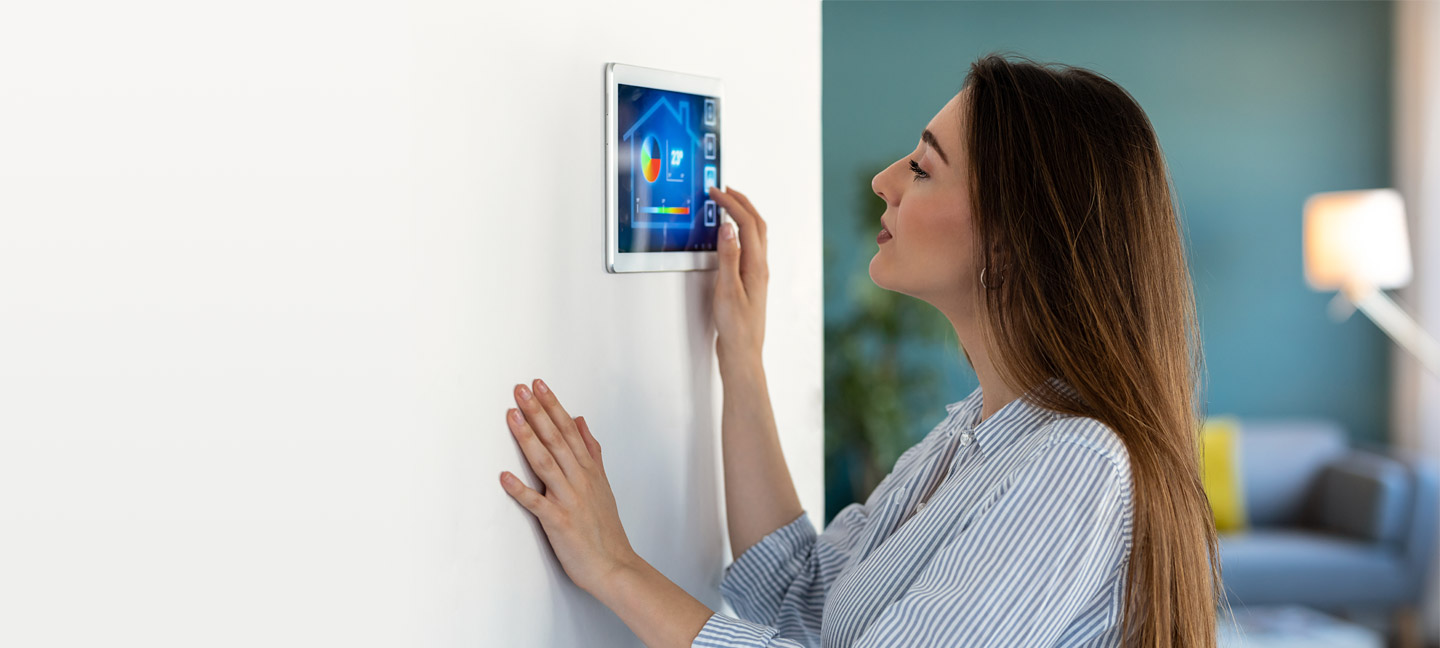 Using the home automation system on digital tablet to regulate the temperature Using the home automation system on digital tablet to regulate the temperature
